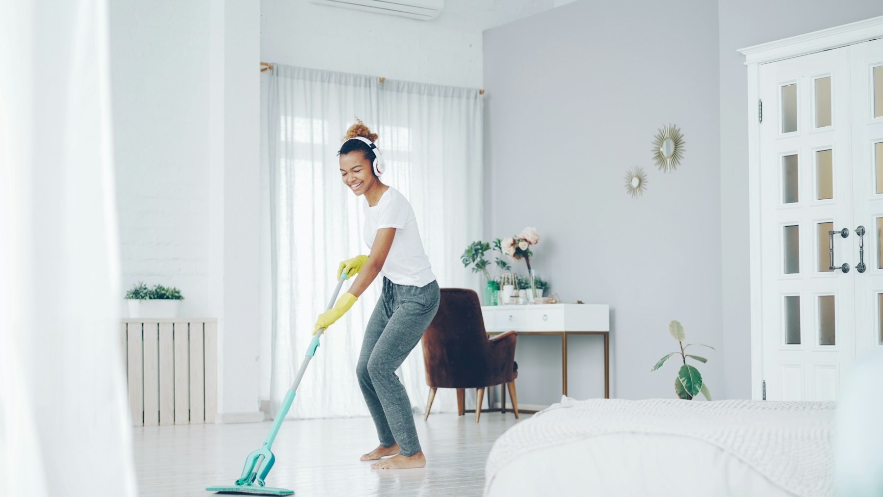 Cleaning staff mopping the floor