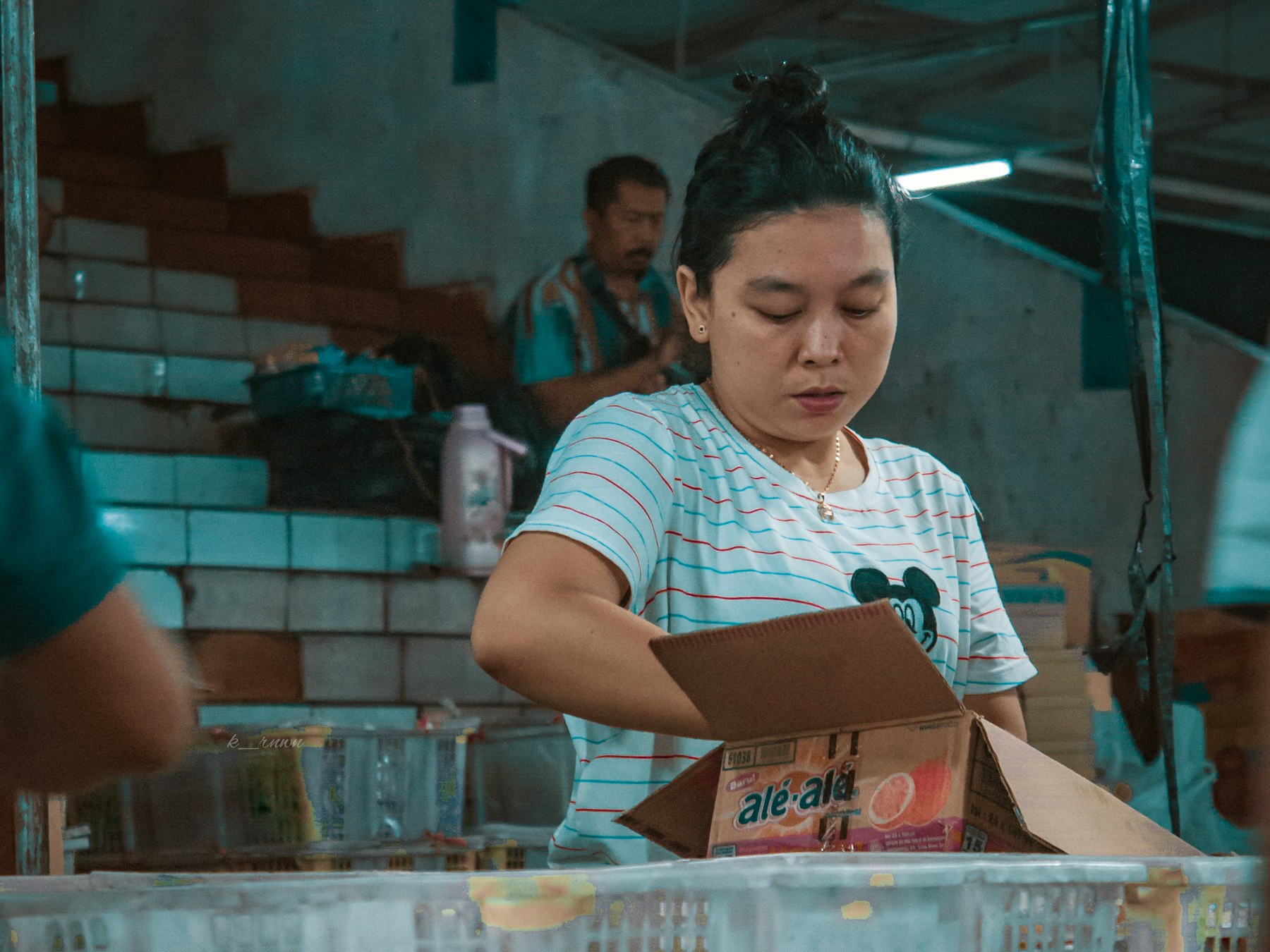 Worker packing boxes